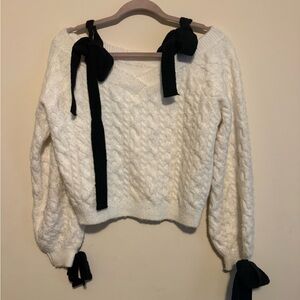 Cider Cream Cable-Knit Off-Shoulder Sweater with Black Bow Straps